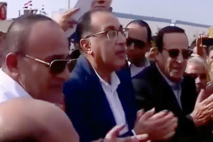 Ibrahim al-Organi, left, with Egypt’s prime minister Mostafa Madbouly, centre, during a visit to North Sina