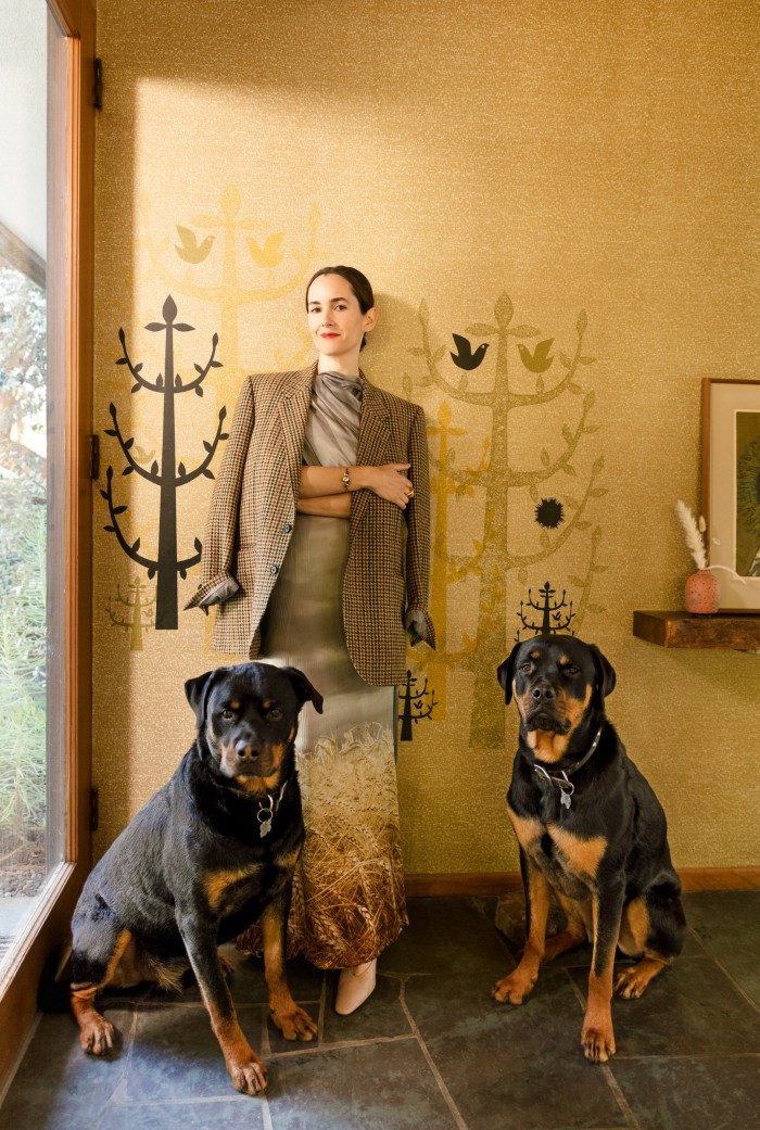 Welch at home in LA (with her rottweilers Tommy and Ziggy), wearing a Rodarte Van Gogh dress