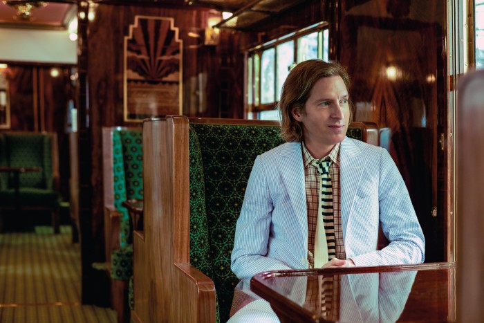 Wes Anderson in the Belmond British Pullman carriage he designed