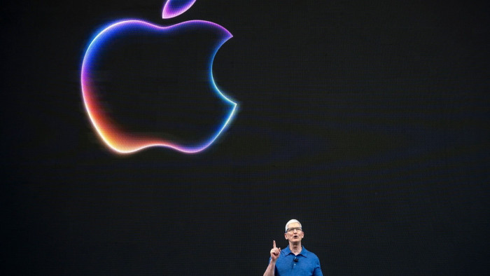 Apple chief executive Tim Cook speaking on stage at the Apple developers conference on Monday