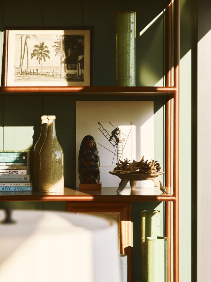 The study belonging to Orlebar Brown founder Adam Brown and his husband Tom Konig, with shelving by Studio Reed