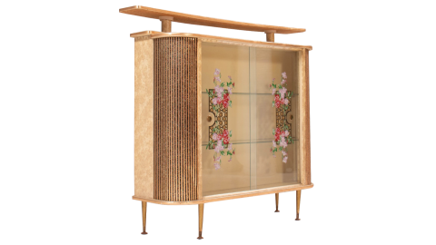 A bar cabinet with glass doors decorated with a floral motif