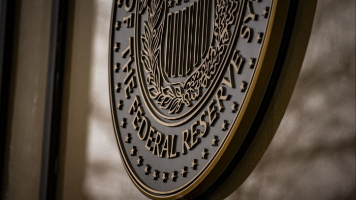 The seal of the US Federal Reserve board of governors at the William McChesney Martin Jr Federal Reserve building in Washington, US