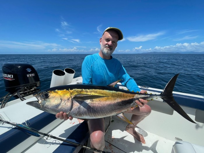 The author with a tuna, caught by top-water casting 