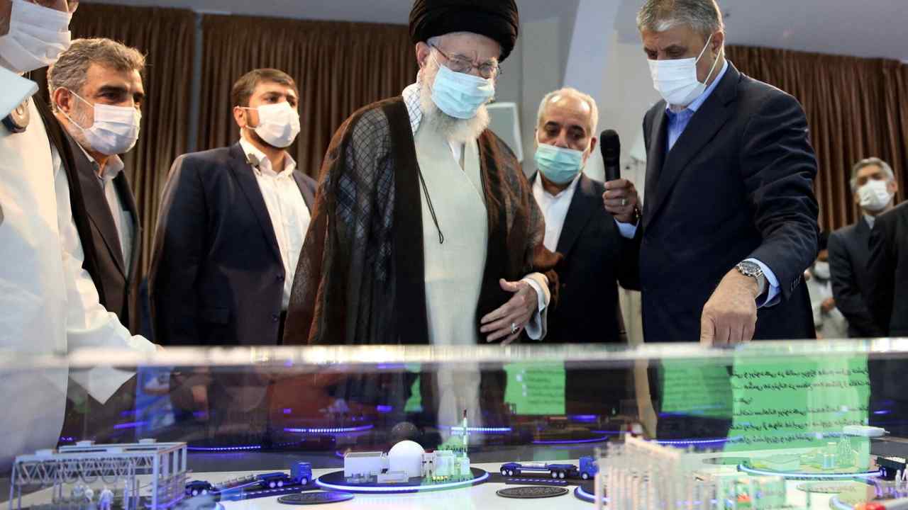 Ayatollah Ali Khamenei viewing a model of a nuclear facility