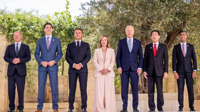 A group photo of Olaf Scholz, Justin Trudeau, Emmanuel Macron, Giorgia Meloni, Joe Biden, Fumio Kishida and Rishi Sunak