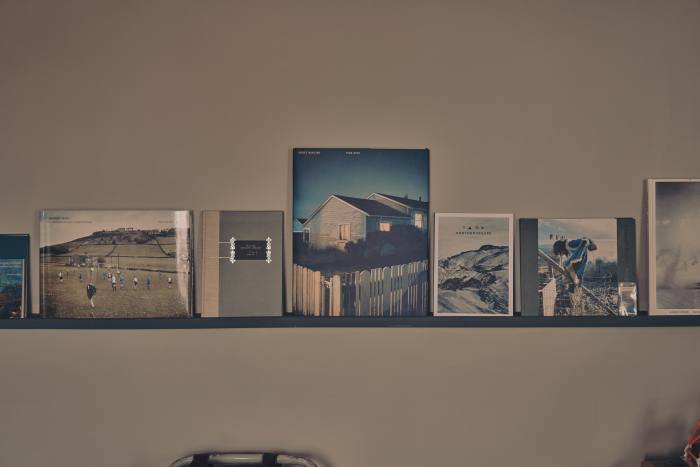 A collection of photography books, including House Hunting by Todd Hido