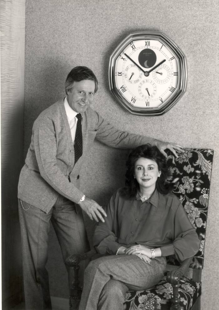 A black and white image of Gérald and Evelyne Genta at their Swiss factory in 1985