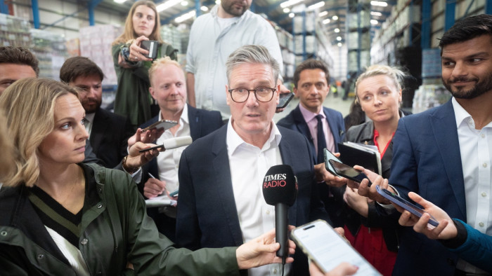 Keir Starmer surrounded by journalists on a visit to drinks manufacturer Global Brands in Chesterfield, Derbyshire, on Tuesday