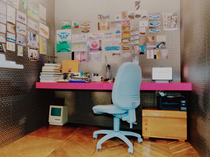 A gaming chair in denim designed by Nuriev and (right, under desk) a dresser from his collaboration with Balenciaga