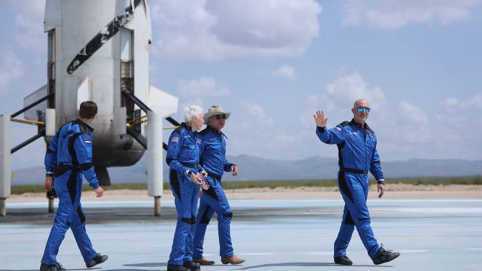 Amazon founder Jeff Bezos with his Blue Origin crew and passengers