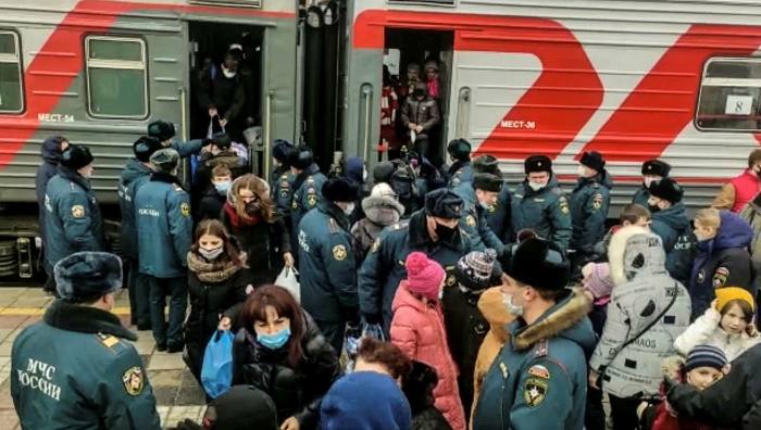 People evacuated from Donetsk arrive by train in Voronezh, Russia
