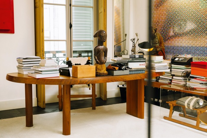 His Charlotte Perriand Free-form table (with a Joseph Beuys Sled to the right)