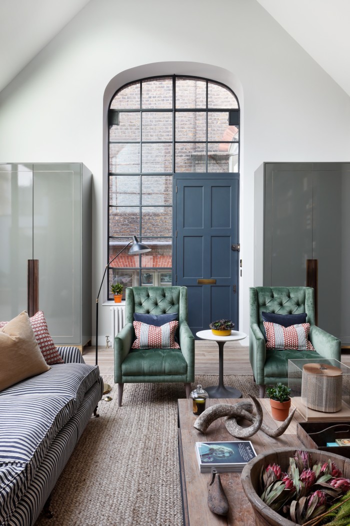 Crittall-style windows flood this South Kensington mews house with light