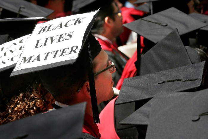 A Harvard student graduates in 2015. Sparked in part by the Black Lives Matter movement, the university’s business school has launched a racial equity action plan
