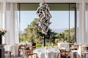 The restaurant at Villa La Coste in the south of France, with a sculpture by Louise Bourgeoi