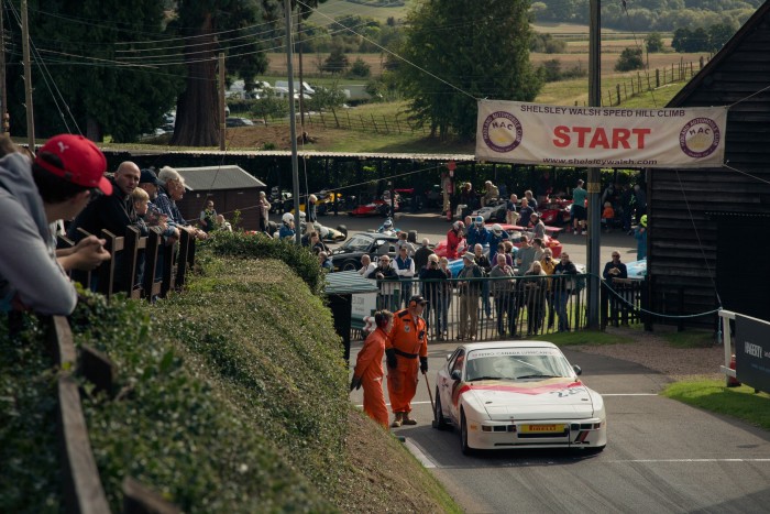 A Porsche 944 stands at the starting line