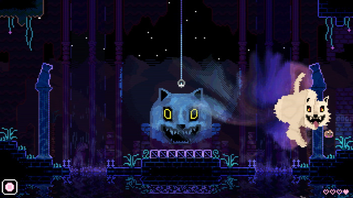 An image from a video game shows a dark environment inhabited by cats with malevolent grins