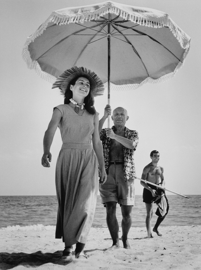 Pablo Picasso with Françoise Gilot and his nephew Javier Vilato on the beach at Golfe-Juan, 1948