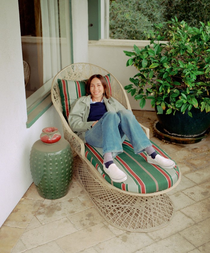Coppola wearing her favourite Vans in her favourite reading spot