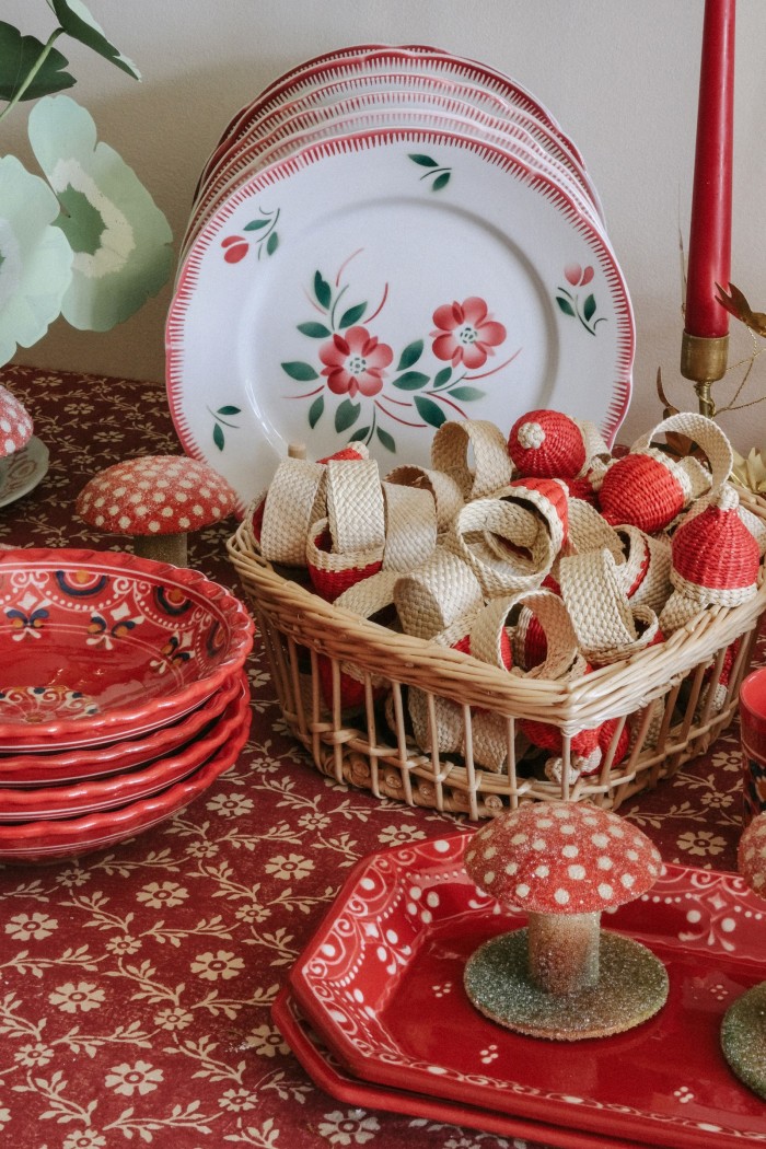 The Christmas tabletop collection including vintage plates and handpainted ceramics from Paris, decorative mushrooms from Germany and Santa-shaped napkin rings