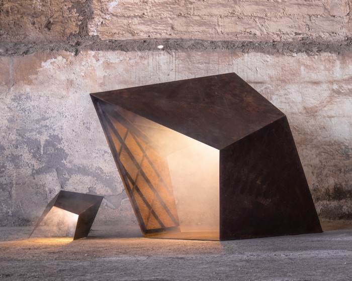 Two luminous abstract sculptures of different sizes 