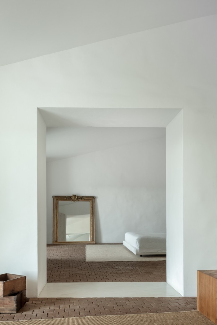 A bedroom seen from the living area at Casa no Tempo