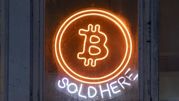 An illuminated logo for Bitcoin in Hong Kong