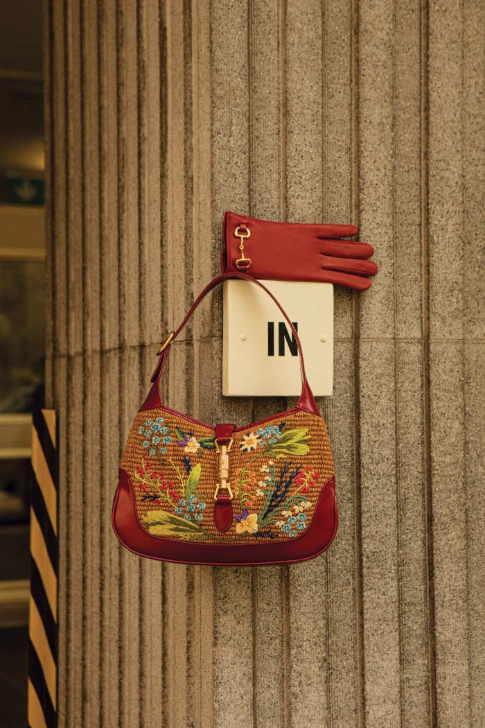 Gucci straw-effect fabric and leather small embroidered Jackie 1961 bag, £2,110, and leather gloves, £355