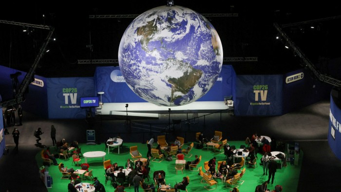 A huge globe behind the stage at COP26