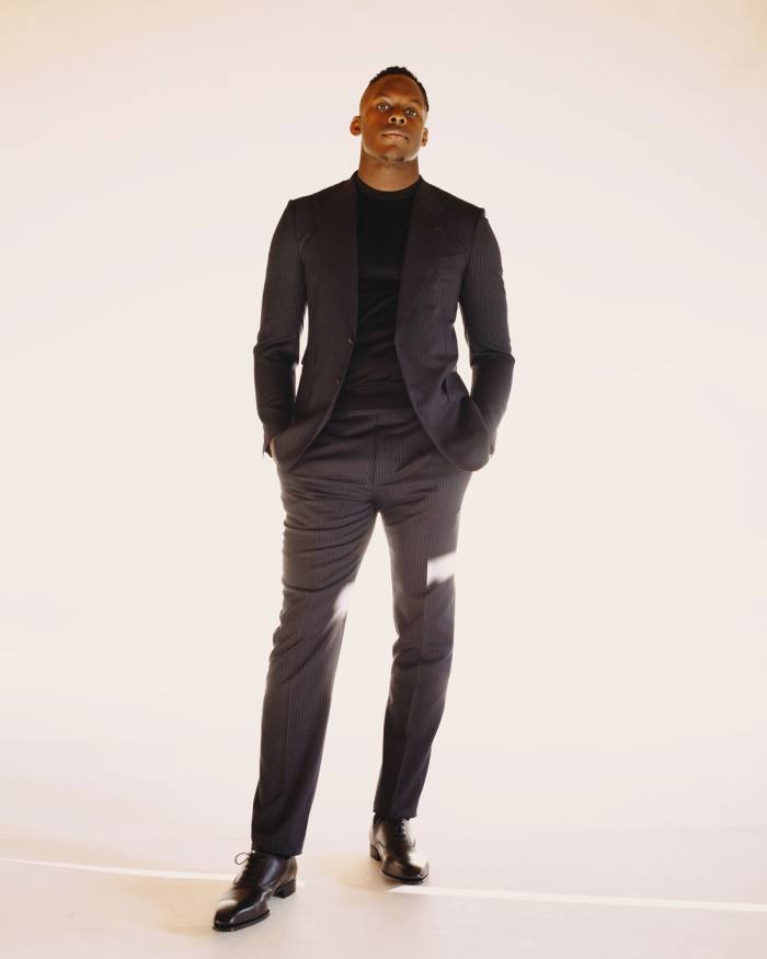 Tom Ford wool suit, £2,780. Emporio Armani wool jumper, £215. George Cleverley calfskin shoes, £525
