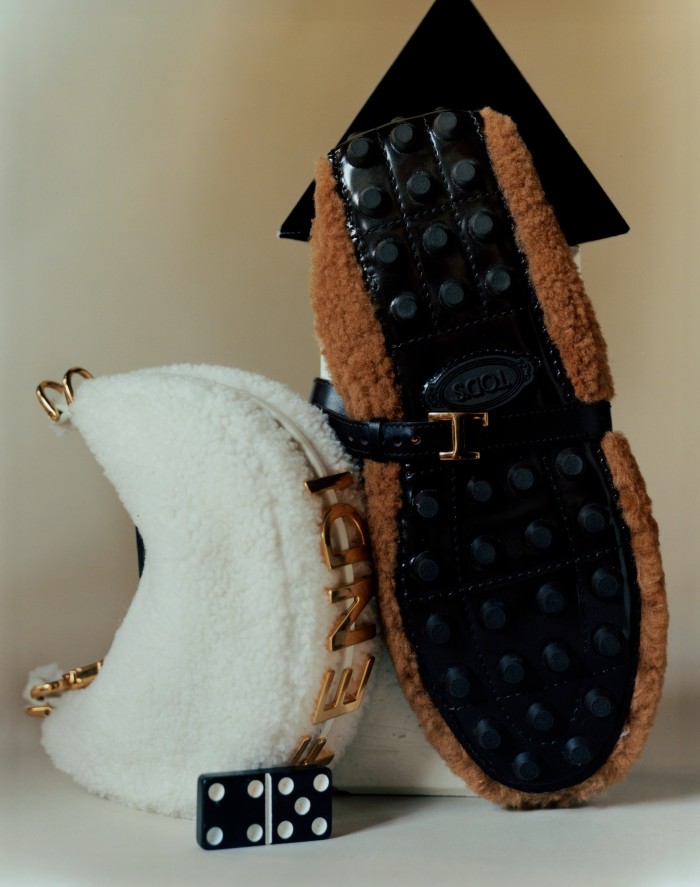 Fendi shearling Mini Fendigraphy bag, £1,150. Tod’s shearling and leather Bubble Ballerina shoes, £690