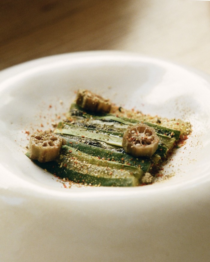 Sake-marinated cucumber, seaweed gel, lacto-fermented okra and oyster leaves