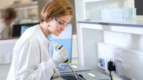 A scientist working at Oxford Nanopore