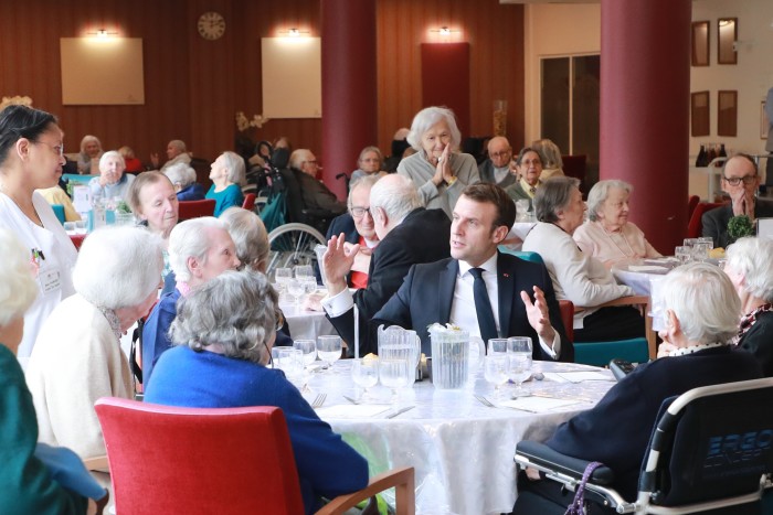 Emmanuel Macron visits a care home for the elderly in Paris on March 6.  Covid-19 swept through such institutions in France. ‘It’s a real public health scandal, and we’re only at the start,’ says one lawyer representing relatives of victims