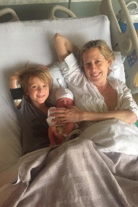 Alfie and Lucinda, with her third child, who was born in America while Alfie was undergoing treatment