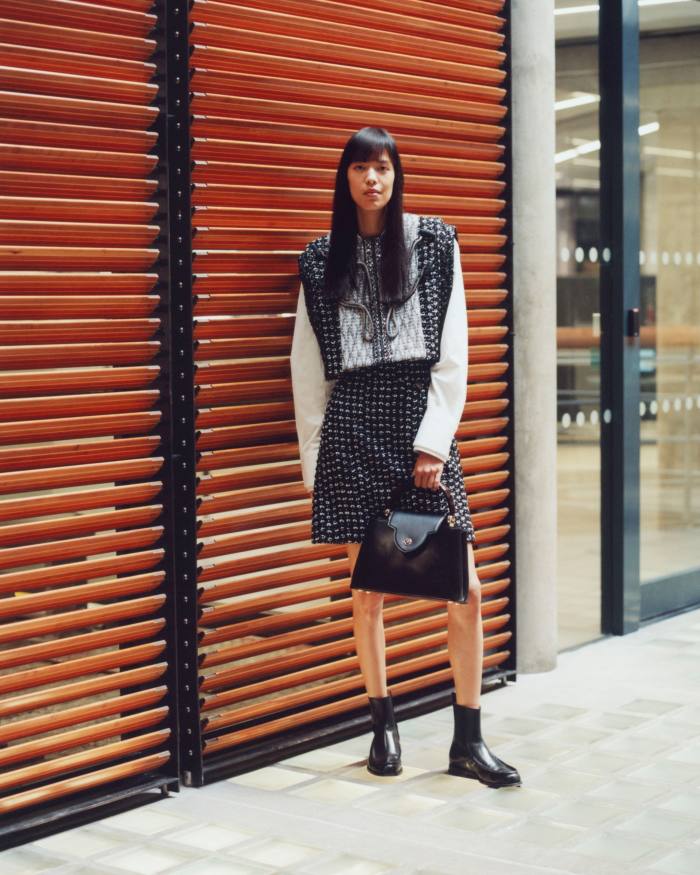 Louis Vuitton cotton, silk and metallised tweed Boxy jacket, £7,400, matching skirt, £1,480, cotton shirt, £920, and leather Capucines MM bag, £5,450. Santoni leather Chelsea boots, £620