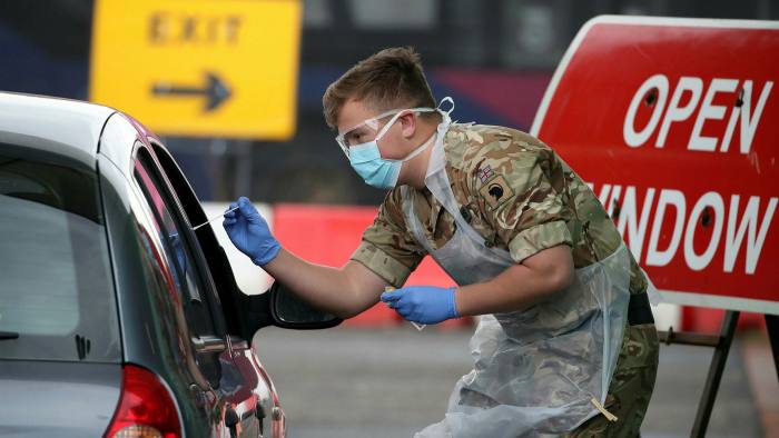 A soldier works at a coronavirus test centre in Scotland in April last year