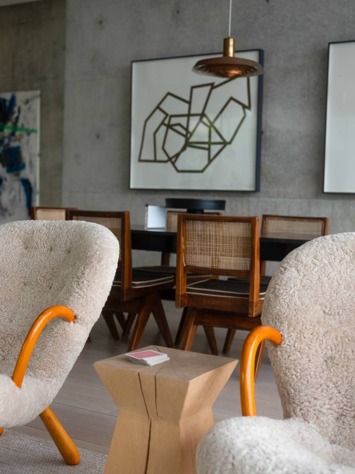 TThe living room of his Texas home with some of his midcentury chairs