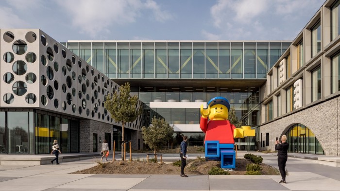 Buildings of Lego’s campus in Denmark with a huge Lego minifigure