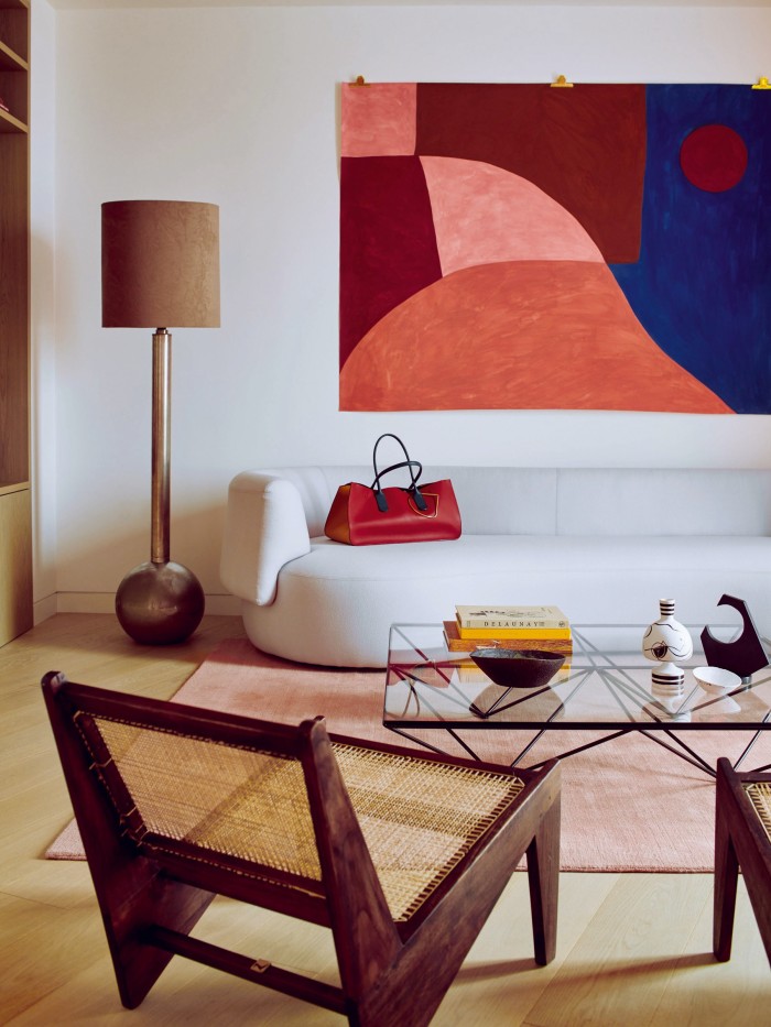 The living room in the Gasholders show apartment features art by Caroline Denervaud