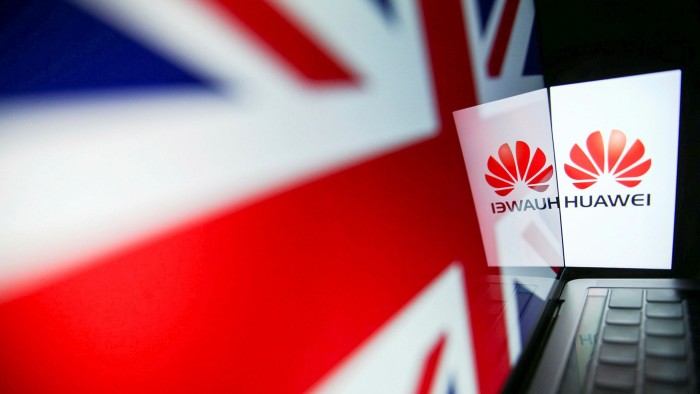 Huawei logo beside the Union Jack flag