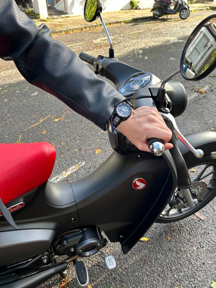 The author wears the new Seiko special edition – with the scooter that inspired it