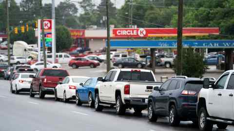 Motorists wait in line to refuel at a Circle K gas station on May 12, 2021 in Fayetteville, North Carolin