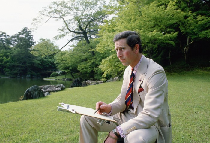 Prince Charles wears a Cartier watch while sketching in Omiya Palace, Japan