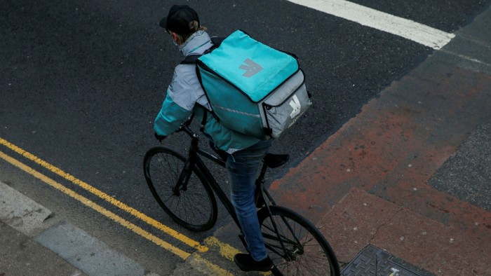 Deliveroo courier on a bike