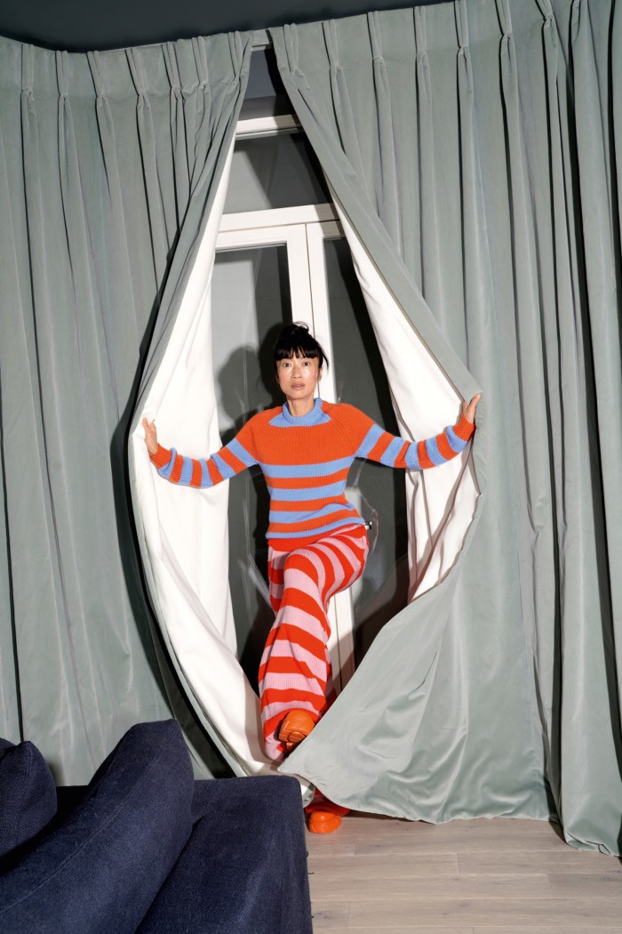 Xu wears a Marni wool striped jumper and trousers