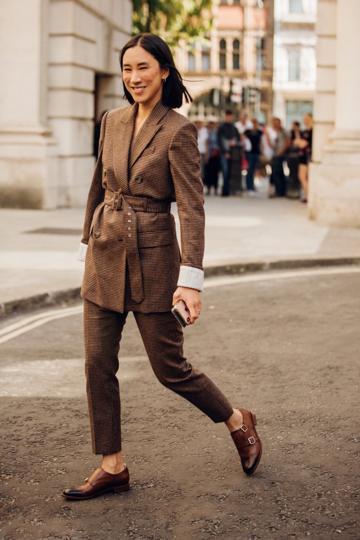 Eva Chen wears a Racil double-breasted houndstooth suit jacket and trousers