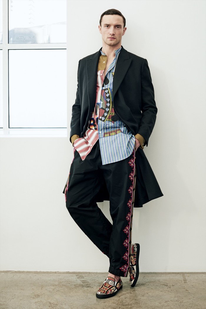 Wool coat, £1,425, cotton patchwork shirt, £495, embroidered cotton trousers, £670, and canvas shoes, £420