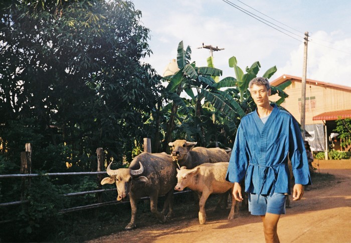 Designer Philip Huang in north-east Thailand, wearing Philip Huang silk and cotton Antto jacket, £510, and cotton Sky Indigo shorts, £275